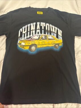 Chinatown Market Black Short-Sleeve Tee with Yellow Car Graphic